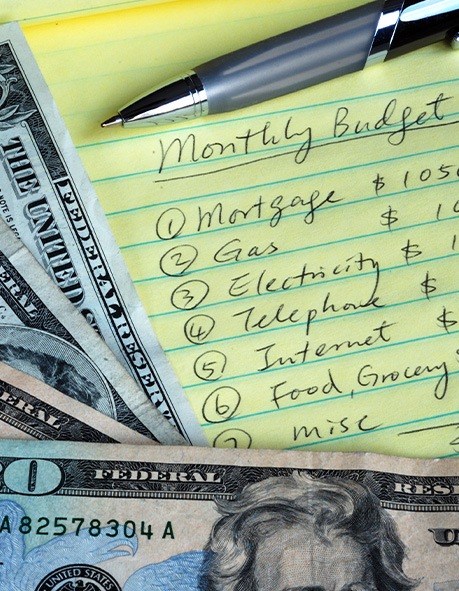 Norwood patient budgeting for dental implants
