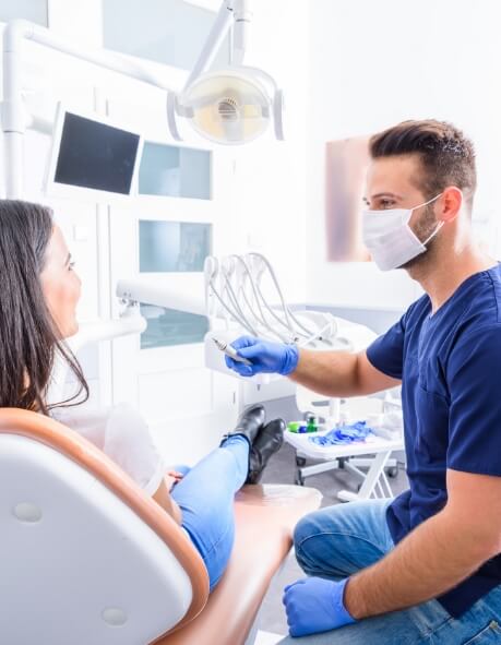 Dentist getting ready to give a patient an exam