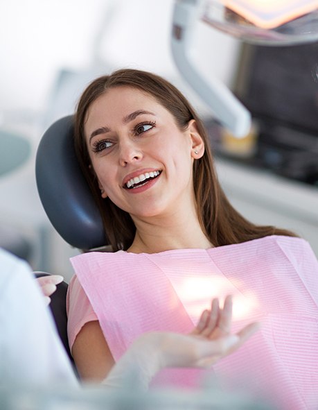 Woman smiling in the dental chair